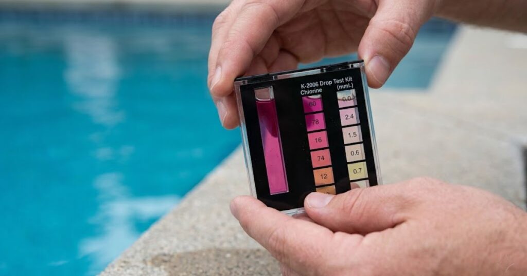 Taylor K-2006 drop test kit measuring free chlorine in pool water — comparator block showing magenta chlorine reading