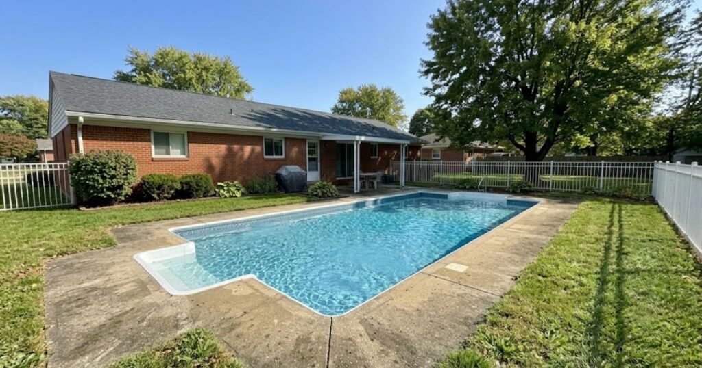 Clean residential backyard swimming pool after phosphate reduction